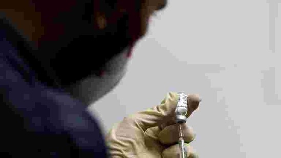 Sharma said the vaccine would be first administered to 80,000 healthcare workers.(Reuters File Photo) Sharma said the vaccine would be first administered to 80,000 healthcare workers.(Reuters File Photo)