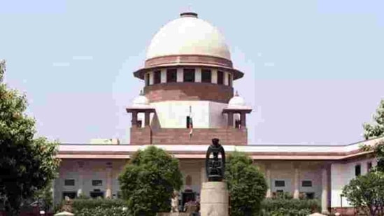 On Tuesday, a three-judge SC bench, headed by Chief Justice of India (CJI) SA Bobde, had said: “We are of the view that a stay of implementation of all the three farm laws for the present may assuage the hurt feelings of the farmers and encourage them to come to the negotiating table with confidence and good faith.”(HT PHOTO) On Tuesday, a three-judge SC bench, headed by Chief Justice of India (CJI) SA Bobde, had said: “We are of the view that a stay of implementation of all the three farm laws for the present may assuage the hurt feelings of the farmers and encourage them to come to the negotiating table with confidence and good faith.”(HT PHOTO)