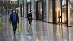 Pedestrians pass by closed stores on the Zeil shopping street in Frankfurt, Germany.(Bloomberg) Pedestrians pass by closed stores on the Zeil shopping street in Frankfurt, Germany.(Bloomberg)