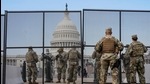 National Guard soldiers maintain a watch over the US Capitol after the House of Representatives impeached US President Donald Trump on January 14. (REUTERS) National Guard soldiers maintain a watch over the US Capitol after the House of Representatives impeached US President Donald Trump on January 14. (REUTERS)