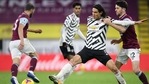 Manchester United's Edinson Cavani fights for the ball during the English Premier League soccer match between Burnley and Manchester United in Burnley, England, Tuesday, Jan. 12, 2021. Manchester won the match 1-0. (Peter Powell/Pool via AP)(AP) Manchester United's Edinson Cavani fights for the ball during the English Premier League soccer match between Burnley and Manchester United in Burnley, England, Tuesday, Jan. 12, 2021. Manchester won the match 1-0. (Peter Powell/Pool via AP)(AP)