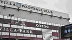 FILE - This Saturday, Nov. 21, 2020 file photo shows a general view of a social distancing message on display outside the Villa Park stadium, home of Aston Villa, in Birmingham, England. Aston Villa has on Thursday, Jan. 7, 2021 reported a “significant” coronavirus outbreak and closed its training ground a day before a scheduled FA Cup home game against Liverpool. Villa says “discussions are ongoing between medical representatives of the club, the Football Association and the Premier League.”(AP) FILE - This Saturday, Nov. 21, 2020 file photo shows a general view of a social distancing message on display outside the Villa Park stadium, home of Aston Villa, in Birmingham, England. Aston Villa has on Thursday, Jan. 7, 2021 reported a “significant” coronavirus outbreak and closed its training ground a day before a scheduled FA Cup home game against Liverpool. Villa says “discussions are ongoing between medical representatives of the club, the Football Association and the Premier League.”(AP)