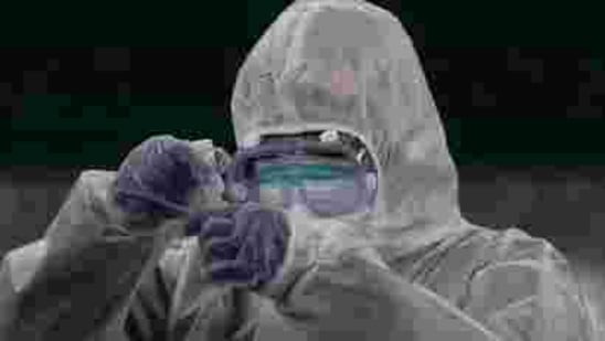 A doctor prepares coronavirus testing for residents. (AP) A doctor prepares coronavirus testing for residents. (AP)