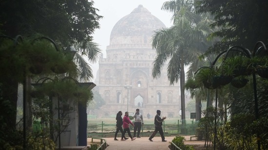 Morning walkers at Lodhi Garden on January 13. The minimum temperature is expected to rise marginally on January 15, before falling again on January 16. (Amal KS / HT Photo)