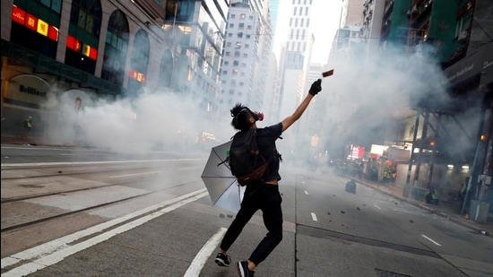 An anti-government protester reacts as police fire tear gas during a march billed as a global "emergency call" for autonomy, in Hong Kong on November 2, 2019. (REUTERS file) An anti-government protester reacts as police fire tear gas during a march billed as a global "emergency call" for autonomy, in Hong Kong on November 2, 2019. (REUTERS file)
