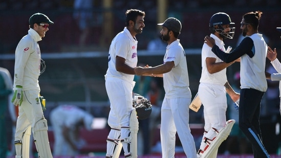 India's captain Ajinkya Rahane along with his teammates Ravichandran Ashwin, Hanuma Vihari and Mohammed Siraj greet each other at the end of the third cricket Test match between Australia and India at the Sydney Cricket Ground (AFP) India's captain Ajinkya Rahane along with his teammates Ravichandran Ashwin, Hanuma Vihari and Mohammed Siraj greet each other at the end of the third cricket Test match between Australia and India at the Sydney Cricket Ground (AFP)