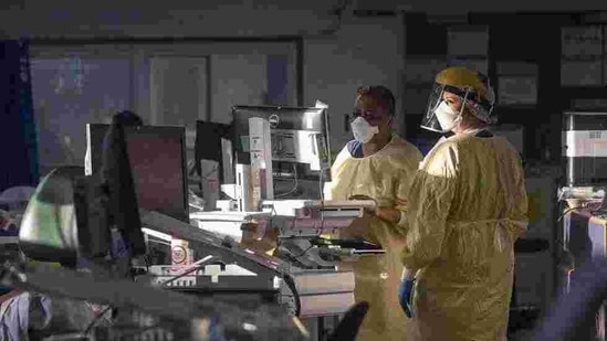 Nurses work with patients inside the Intensive Care Unit at St George's Hospital in London,(AP) Nurses work with patients inside the Intensive Care Unit at St George's Hospital in London,(AP)