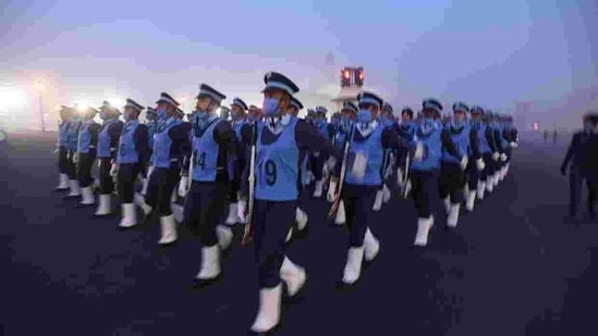 A cold wave gripped the national capital too. Here, Indian Air Force personnel can be seen rehearsing for the Republic Day parade at Vijay Chowk. (Raj K Raj/Hindustan Times)