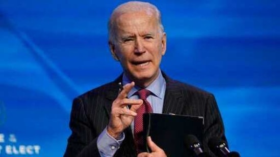 President-elect Joe Biden speaks during an event at The Queen theater in Wilmington, Delaware. A coronavirus action plan from Biden centers on a mass vaccination campaign and closer coordination among all levels of government. The Biden plan comes as a divided nation remains caught in the grip of the pandemic’s most dangerous wave yet. (AP) President-elect Joe Biden speaks during an event at The Queen theater in Wilmington, Delaware. A coronavirus action plan from Biden centers on a mass vaccination campaign and closer coordination among all levels of government. The Biden plan comes as a divided nation remains caught in the grip of the pandemic’s most dangerous wave yet. (AP)