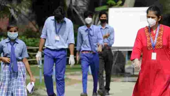 Noida, India - September 23, 2020: Students exit an examination centre after appearing for the Class X and Class XII CBSE Compartment Exam at Delhi Public School in Sector 30, Noida, India, on Wednesday, September 23, 2020. (Photo by Sunil Ghosh / Hindustan Times) Noida, India - September 23, 2020: Students exit an examination centre after appearing for the Class X and Class XII CBSE Compartment Exam at Delhi Public School in Sector 30, Noida, India, on Wednesday, September 23, 2020. (Photo by Sunil Ghosh / Hindustan Times)