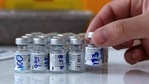 A nurse holds a vial of a Pfizer-BioNTech Covid-19 vaccine at Hospital Posta Central in Santiago, on January 15, 2021. CLAUDIO REYES/AFP (Photo by CLAUDIO REYES / AFP)(AFP) A nurse holds a vial of a Pfizer-BioNTech Covid-19 vaccine at Hospital Posta Central in Santiago, on January 15, 2021. CLAUDIO REYES/AFP (Photo by CLAUDIO REYES / AFP)(AFP)