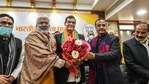 Former IAS officer Arvind Kumar Sharma being greeted by UP BJP president Swatantra Dav Singh and deputy CM Dinesh Sharma.(PTI Photo) Former IAS officer Arvind Kumar Sharma being greeted by UP BJP president Swatantra Dav Singh and deputy CM Dinesh Sharma.(PTI Photo)