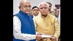 Haryana governor Satyadeo Narain Arya with chief minister Manohar Lal Khattar. (HT file photo) Haryana governor Satyadeo Narain Arya with chief minister Manohar Lal Khattar. (HT file photo)