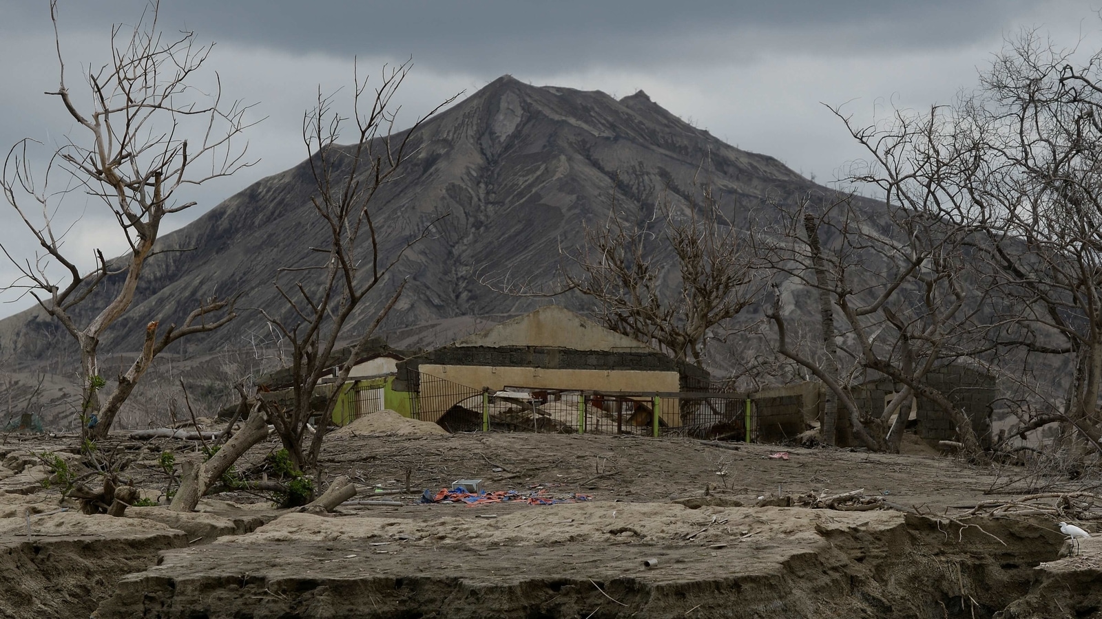 Photos Only ash, shells of homes left on Philippine volcano island