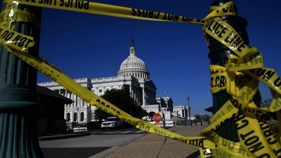 Police tape is seen at the US Capitol in Washington, DC, January 14, 2021, ahead of next week�s presidential inauguration of Joe Biden. (Photo by Olivier DOULIERY / AFP)(AFP)