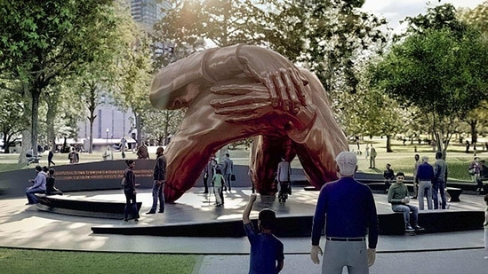 This artist's rendering provided by MASS Design Group illustrates a proposed monument entitled "The Embrace," consisting of four 22-foot-high intertwined bronze arms. As cities and states continue to grapple with the legacy of controversial monuments, Boston is moving forward with a major effort commemorating Martin Luther King Jr. and Coretta Scott King. Organizers are building what they say will be the country's largest memorial dedicated to racial equity at the site of a 1965 civil rights rally that MLK led on the city's historic Boston Common.(Associated Press)