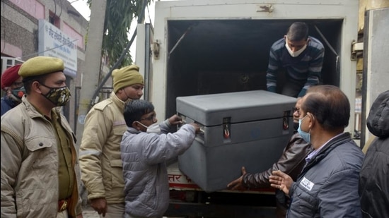 The first lot of Covishield Covid-19 vaccines arrives at the vaccine store at MMG hospital in Ghaziabad on January 14. (Sakib Ali/HT photo) The first lot of Covishield Covid-19 vaccines arrives at the vaccine store at MMG hospital in Ghaziabad on January 14. (Sakib Ali/HT photo)