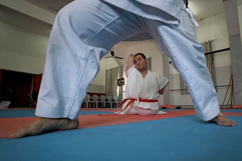 Youssef Abu Amira practices Karate. (REUTERS)