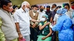 A medic administers the first dose of Covishield vaccine to a health worker in the presence of state CM BS Yediyurappa.(PTI) A medic administers the first dose of Covishield vaccine to a health worker in the presence of state CM BS Yediyurappa.(PTI)