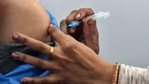 A medic administers the first dose of Covishield vaccine to a frontline worker, after the virtual launch of Covid-19 vaccination drive on Saturday. (PTI Photo ) A medic administers the first dose of Covishield vaccine to a frontline worker, after the virtual launch of Covid-19 vaccination drive on Saturday. (PTI Photo )