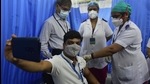 A BMC medical staffer takes a selfie while receiving the a Covid-19 vaccine shot at KEM Hospital. (Anshuman Poyrekar/HT Photo) A BMC medical staffer takes a selfie while receiving the a Covid-19 vaccine shot at KEM Hospital. (Anshuman Poyrekar/HT Photo)