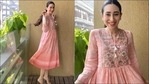 Karisma Kapoor rocks work from home fashion in a romantic pink midi dress(Instagram/therealkarismakapoor) Karisma Kapoor rocks work from home fashion in a romantic pink midi dress(Instagram/therealkarismakapoor)