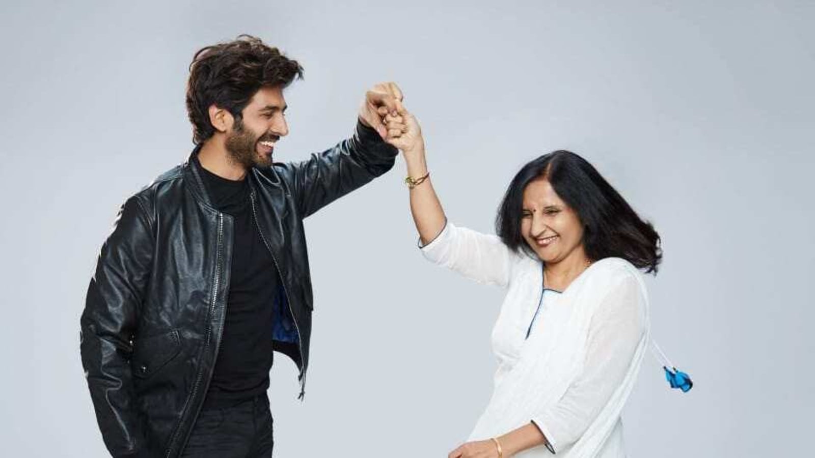 Kartik Aaryan makes his mother twirl as he wishes her on her birthday. See  pic - Hindustan Times