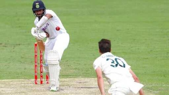 India's Cheteshwar Pujara plays at the ball bowled by Australia's Pat Cummins during play on day two of the fourth cricket test between India and Australia at the Gabba, Brisbane, Australia, (AP) India's Cheteshwar Pujara plays at the ball bowled by Australia's Pat Cummins during play on day two of the fourth cricket test between India and Australia at the Gabba, Brisbane, Australia, (AP)