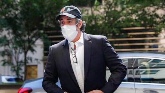 Michael Cohen arrives at his Manhattan apartment in New York after being furloughed from prison because of concerns over the coronavirus.(AP/ File photo) Michael Cohen arrives at his Manhattan apartment in New York after being furloughed from prison because of concerns over the coronavirus.(AP/ File photo)
