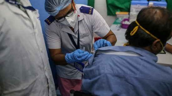 A health worker administers a Covid-19 vaccine to a health worker at the Dr. R N Cooper Municipal General Hospital, in Mumbai, India, on Saturday, Jan. 16, 2021. India launched one of the world�s largest coronavirus vaccination drives on Saturday, setting in motion a complex deployment plan aimed at stemming the wide spread of infections across a nation of more than 1.3 billion people. Photographer: Dhiraj Singh/Bloomberg(Bloomberg) A health worker administers a Covid-19 vaccine to a health worker at the Dr. R N Cooper Municipal General Hospital, in Mumbai, India, on Saturday, Jan. 16, 2021. India launched one of the world�s largest coronavirus vaccination drives on Saturday, setting in motion a complex deployment plan aimed at stemming the wide spread of infections across a nation of more than 1.3 billion people. Photographer: Dhiraj Singh/Bloomberg(Bloomberg)