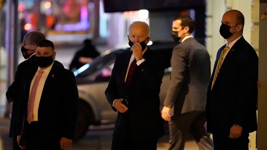 President-elect Joe Biden adjusts his face mask as he departs an event at The Queen theatre in Wilmington.(AP) President-elect Joe Biden adjusts his face mask as he departs an event at The Queen theatre in Wilmington.(AP)