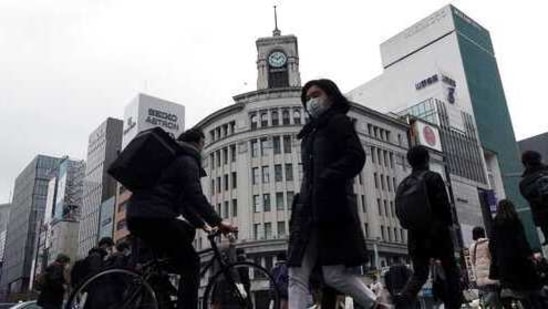 People wearing protective masks to help curb the spread of the coronavirus walk in the Ginza shipping area of Tokyo Friday, Jan. 15, 2021. The Japanese capital confirmed more than 2000 new coronavirus cases on Friday. (AP Photo/Eugene Hoshiko)(AP) People wearing protective masks to help curb the spread of the coronavirus walk in the Ginza shipping area of Tokyo Friday, Jan. 15, 2021. The Japanese capital confirmed more than 2000 new coronavirus cases on Friday. (AP Photo/Eugene Hoshiko)(AP)