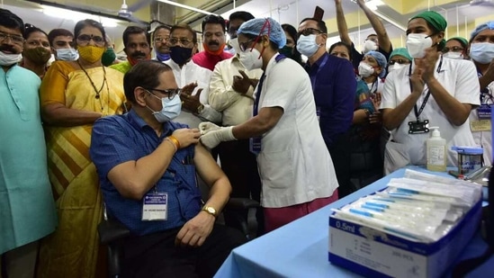 Academic Dean Milind Nadkar receiving the first vaccine shot at KEM hospital in Mumbai. (Anshuman Poyrekar) Academic Dean Milind Nadkar receiving the first vaccine shot at KEM hospital in Mumbai. (Anshuman Poyrekar)