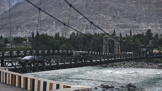 Vehicles cross a wooden plank cable suspension bridge over the Indus river in Gilgit.(Reuters file) Vehicles cross a wooden plank cable suspension bridge over the Indus river in Gilgit.(Reuters file)
