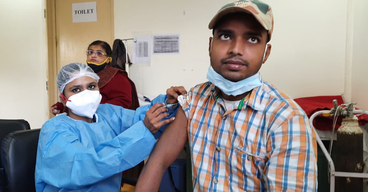 Covid 19 vaccine given to one of the volunteer at DadaDev Hospital near Dwarka. (HT Photo/ Vipin Kumar)