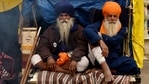 Farmers sitting inside their tractor-trolley amid their protest against the new farm laws at SInghu Border in New Delhi on Friday. (ANI Photo)