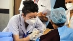 A health worker receives a Covid-19 vaccine shot, at AIIMS in New Delhi on Saturday. (ANI Photo) A health worker receives a Covid-19 vaccine shot, at AIIMS in New Delhi on Saturday. (ANI Photo)