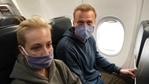 Alexei Navalny and his wife Yulia sit in the plane prior to flight to Moscow in the Airport Berlin Brandenburg in Schoenefeld, Germany.(AP) Alexei Navalny and his wife Yulia sit in the plane prior to flight to Moscow in the Airport Berlin Brandenburg in Schoenefeld, Germany.(AP)