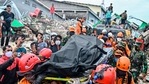Rescuers move the body of a victim that was trapped in a collapsed building in Mamuju a day after a 6.2-magnitude earthquake rocked Indonesia's Sulawesi island. (AP) Rescuers move the body of a victim that was trapped in a collapsed building in Mamuju a day after a 6.2-magnitude earthquake rocked Indonesia's Sulawesi island. (AP)