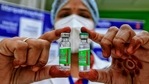 A medic shows Covishield vaccine vials, after the virtual launch of the Covid-19 vaccination drive by Prime Minister Narendra Modi, at Manipal Hospital in Jaipur, Saturday, Jan. 16, 2021.(PTI) A medic shows Covishield vaccine vials, after the virtual launch of the Covid-19 vaccination drive by Prime Minister Narendra Modi, at Manipal Hospital in Jaipur, Saturday, Jan. 16, 2021.(PTI)
