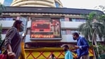 People walk past the Bombay Stock Exchange (BSE) building in Mumbai, Monday,(PTI) People walk past the Bombay Stock Exchange (BSE) building in Mumbai, Monday,(PTI)