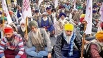 Farmers during the ongoing protest against the new agriculture laws at Delhi’s Singhu border on Sunday. Farmers during the ongoing protest against the new agriculture laws at Delhi’s Singhu border on Sunday.