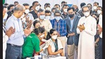 A medic administers the first dose of Covishield vaccine to Madhura Patil in the presence of Maharashtra Chief Minister Uddhav Thackeray at BKC. (Pratik Chorge/HT Photo) A medic administers the first dose of Covishield vaccine to Madhura Patil in the presence of Maharashtra Chief Minister Uddhav Thackeray at BKC. (Pratik Chorge/HT Photo)