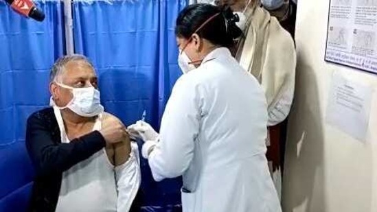 Health care workers administering the COVID-19 vaccine, in the presence of the Minister of State for Health and Family Welfare, Ashwini Kumar Choubey, during the 1st phase of the pan India rollout of COVID-19 vaccination drive, at Dr. Ram Manohar Lohia Hospital, New Delhi on Saturday. (ANI Photo) Health care workers administering the COVID-19 vaccine, in the presence of the Minister of State for Health and Family Welfare, Ashwini Kumar Choubey, during the 1st phase of the pan India rollout of COVID-19 vaccination drive, at Dr. Ram Manohar Lohia Hospital, New Delhi on Saturday. (ANI Photo)