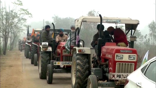 Farmers leave from Ludhiana for Delhi to participate in a tractor march, on Sunday. (ANI Photo)