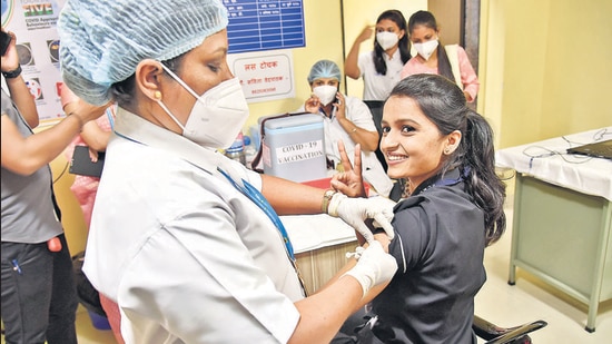 A doctor gets the Covid-19 vaccine jab at Jijamata Hospital, Pimpri, on Saturday. (HT PHOTO) A doctor gets the Covid-19 vaccine jab at Jijamata Hospital, Pimpri, on Saturday. (HT PHOTO)