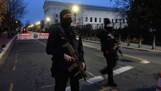 Members of the DC Police maintain security near the US Capitol in Washington, DC. (AP) Members of the DC Police maintain security near the US Capitol in Washington, DC. (AP)