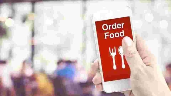 Customers taking food delivery at their home or office are paying 13 per cent higher price on the same food and beverages compared to customers who are walking down to restaurants. (Representational Photo) Customers taking food delivery at their home or office are paying 13 per cent higher price on the same food and beverages compared to customers who are walking down to restaurants. (Representational Photo)