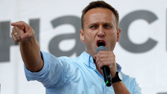 Russian opposition activist Alexei Navalny gestures while speaking to a crowd during a political protest in Moscow, Russia. (AP) Russian opposition activist Alexei Navalny gestures while speaking to a crowd during a political protest in Moscow, Russia. (AP)