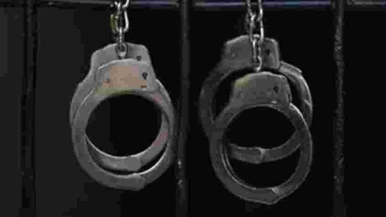 Handcuffs hang in a prison.(REUTERS/Representative image)